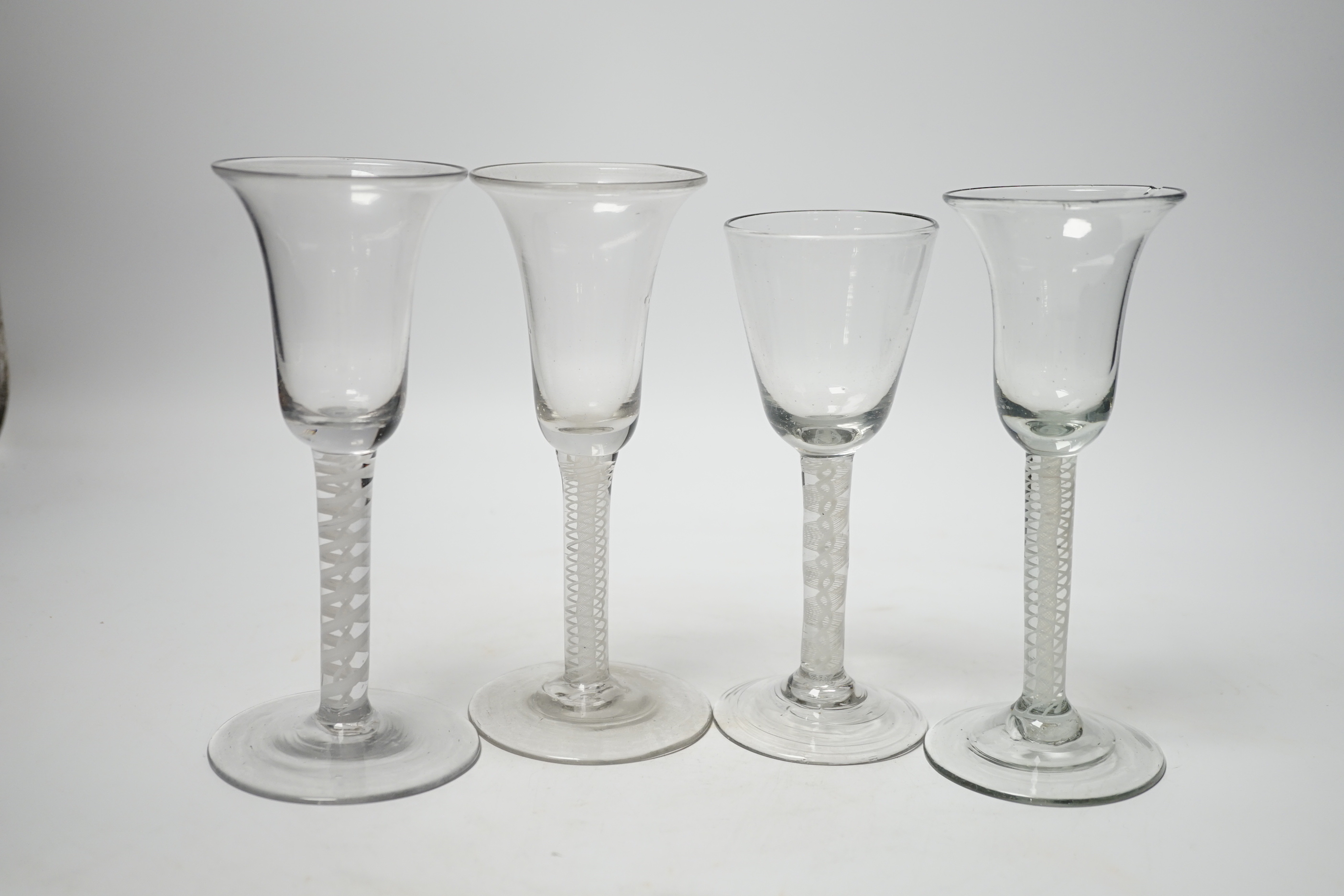 Four 18th century Dutch wine glasses with DSOT stems, three with bell-shaped bowls, one example with folded foot, tallest, 16.5cm